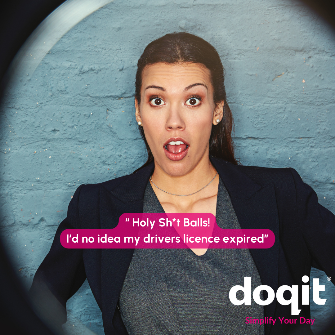 Image shows young woman against a blue brick background. She has her mouth open in surprise.